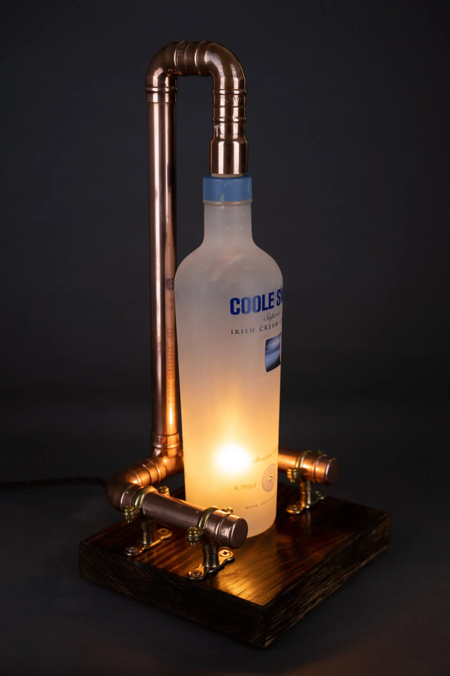 Handmade lamp built from an upcycled bottle