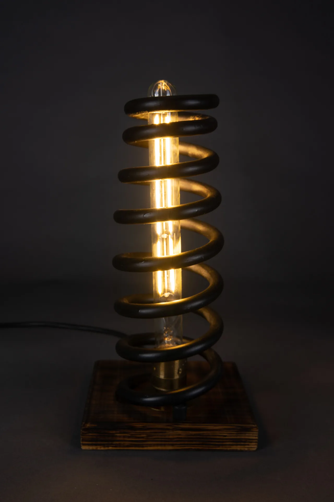 Handmade lamp built from a coil spring